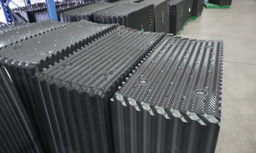 Film fill cooling towe